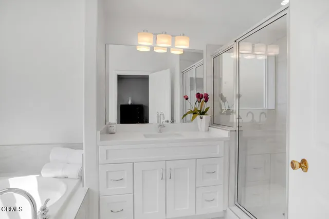 a view of a hallway with a living room