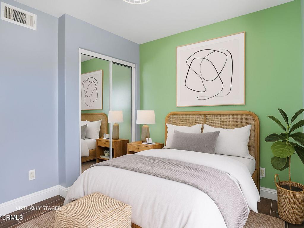 1300 Blue Hill Road Los Angeles, CA 90041 - Photo 37 of 54 a bedroom with a bed and painting on the wall