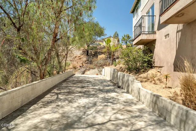 a view of a balcony with an outdoor space
