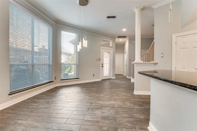 a view of an empty room and window