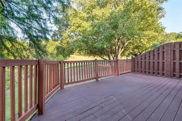a view of a wooden fence