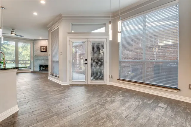 a view of livingroom with furniture and large window