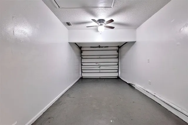 a view of a livingroom with a ceiling fan