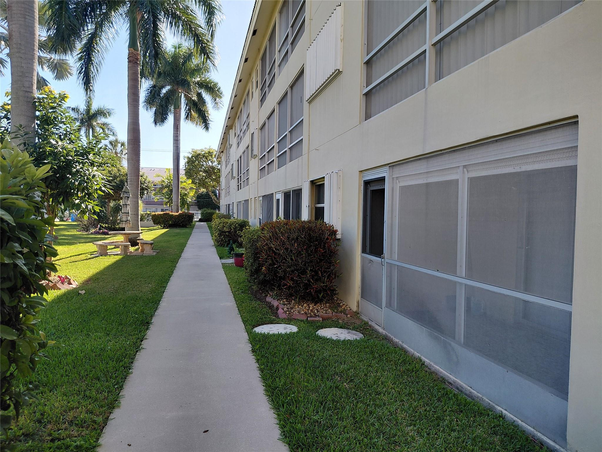 1951 Northeast 39th Street, Unit 127 Lighthouse Point, FL 33064 - Photo 24 of 35 EXTERIOR BACK