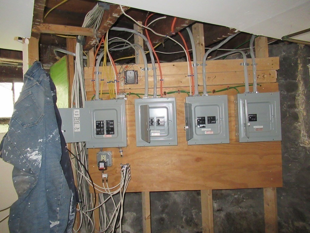 39 Glen Road Boston, MA 02130 - Photo 14 of 15 a view of a patio with table and chairs with wooden floor