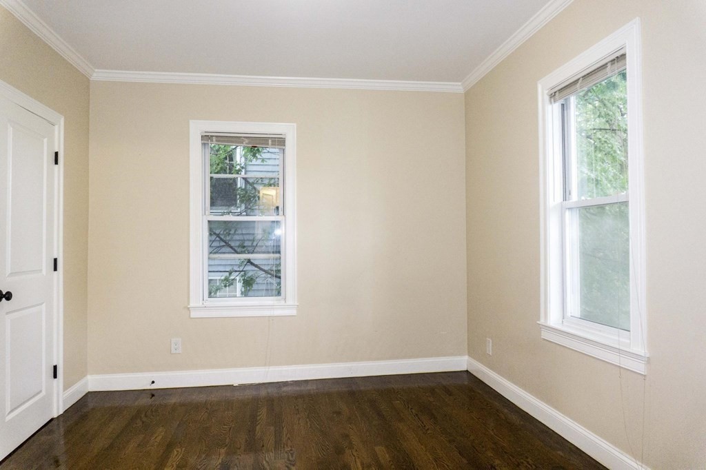 39 Glen Road Boston, MA 02130 - Photo 9 of 15 an empty room with a window