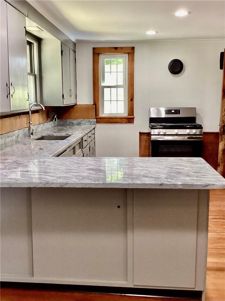 22 Hunns Lake Road Stanfordville, NY 12581 - Photo 13 of 36 a kitchen with a sink and a refrigerator