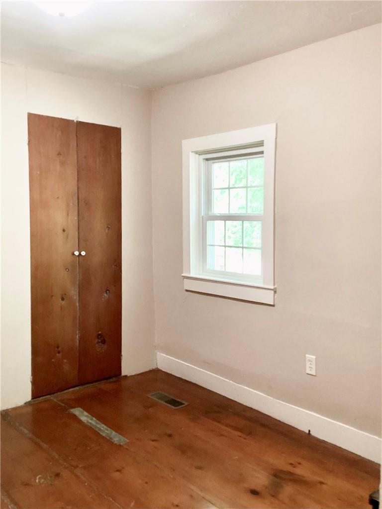 22 Hunns Lake Road Stanfordville, NY 12581 - Photo 21 of 36 a view of an empty room with wooden floor and a window