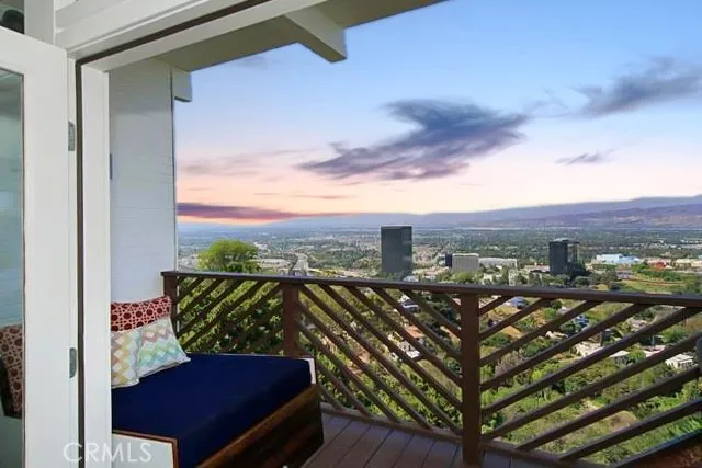 a view of a city from a balcony