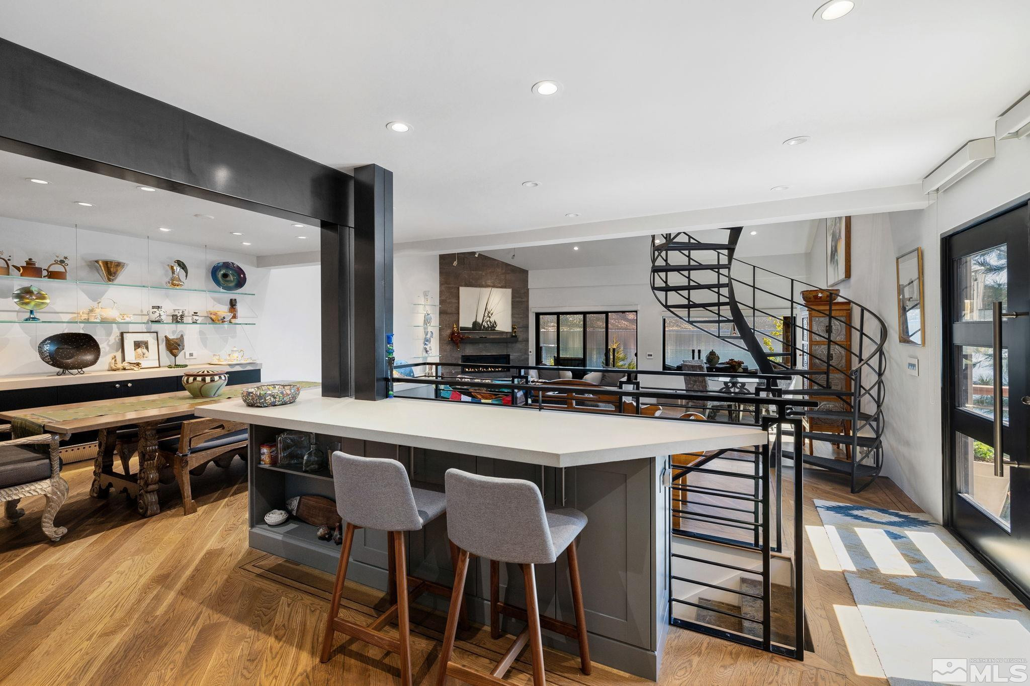 475 Lakeshore Boulevard, Unit 36 Incline Village, NV 89451 - Photo 19 of 40 a large kitchen with a table and chairs in it