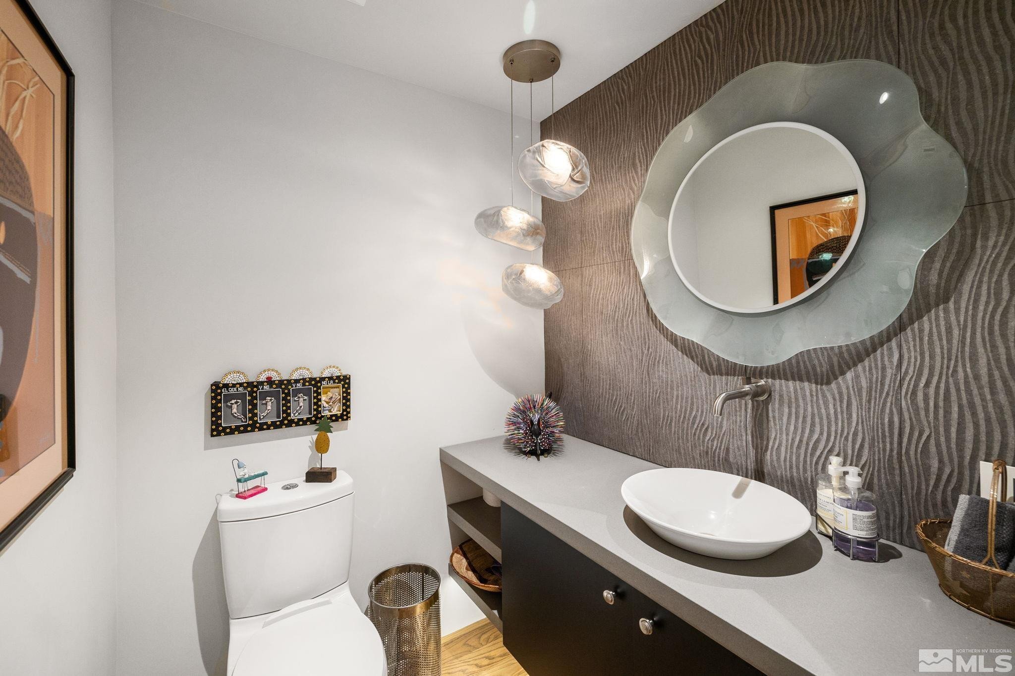 475 Lakeshore Boulevard, Unit 36 Incline Village, NV 89451 - Photo 21 of 40 a bathroom with a toilet a sink and a mirror