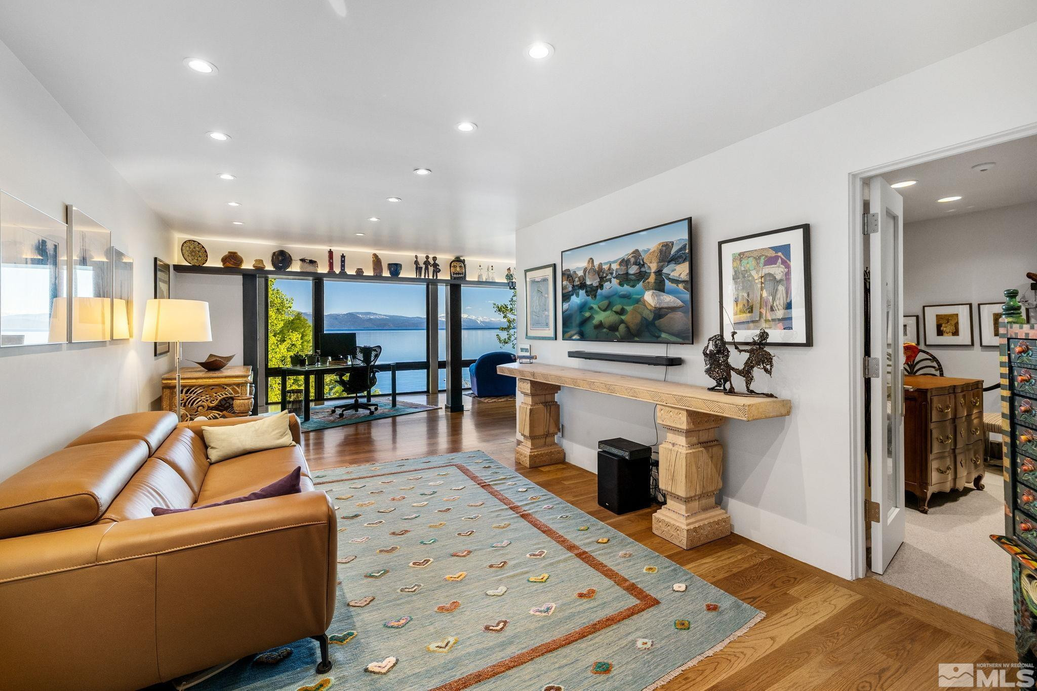 475 Lakeshore Boulevard, Unit 36 Incline Village, NV 89451 - Photo 24 of 40 a living room with furniture and a flat screen tv