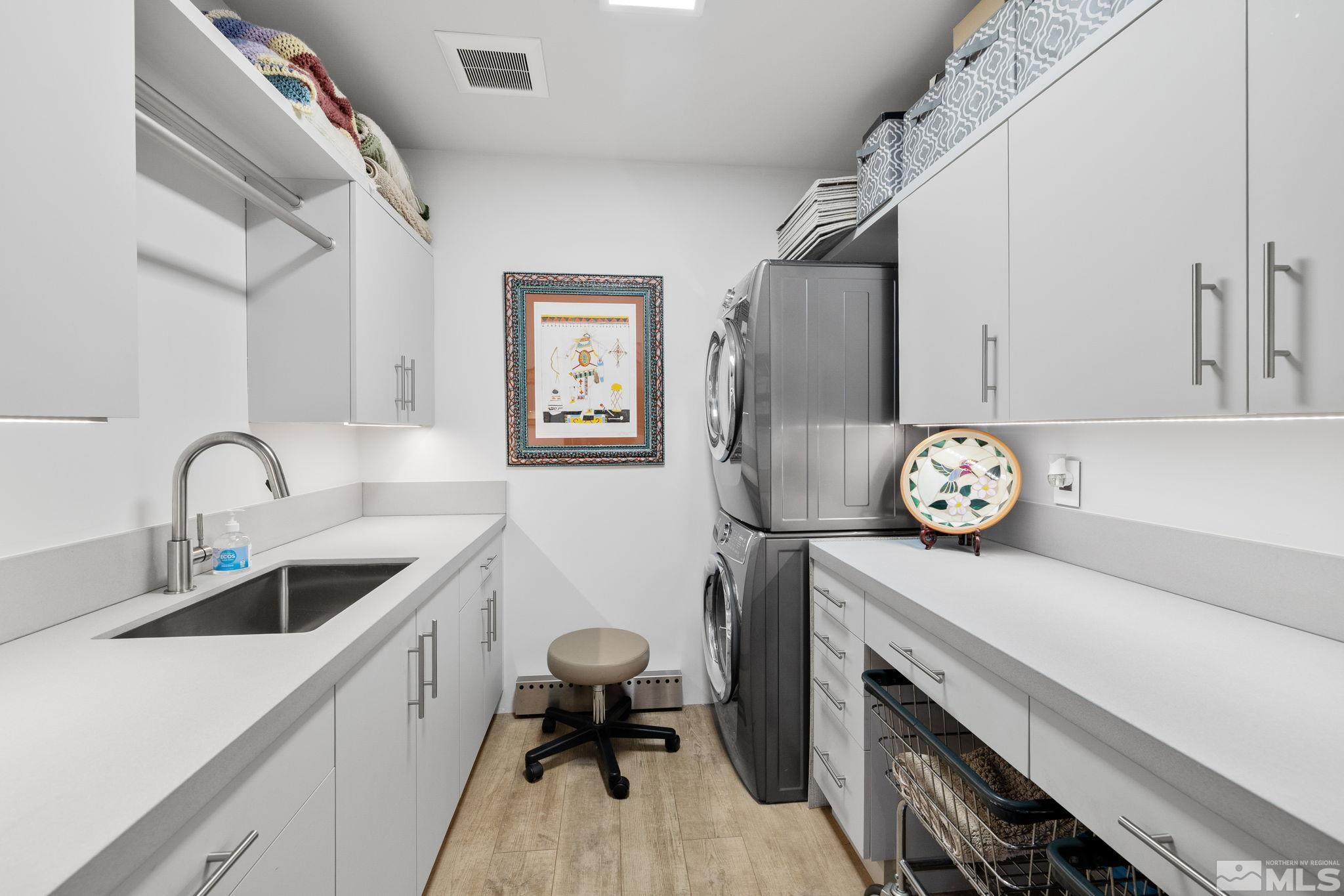 475 Lakeshore Boulevard, Unit 36 Incline Village, NV 89451 - Photo 33 of 40 a view of a kitchen with a sink and wooden floor