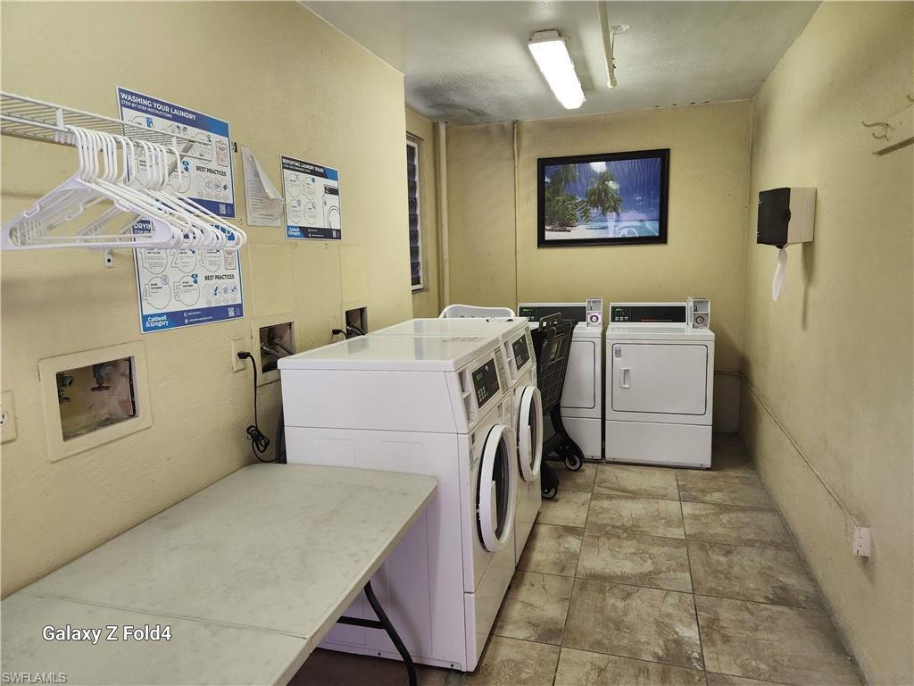 805 River Point Drive, Unit C307 Naples, FL 34102 - Photo 9 of 11 a utility room with dryer and washer