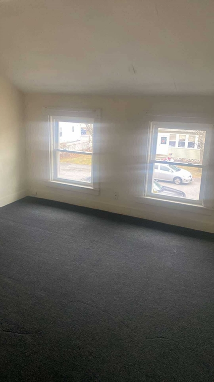 14-24 C Street, Unit 18 Northbridge, MA 01588 - Photo 8 of 9 an empty room with a window
