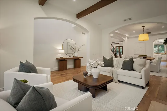 a view of bathroom with a sink and mirror