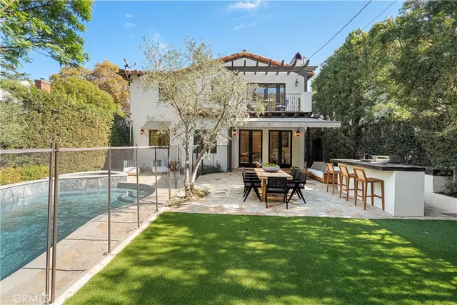 a view of pool with a patio