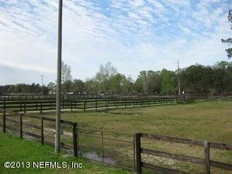 4060 South Francis Road St. Augustine, FL 32092 - Photo 14 of 25 a view of a golf course with a lake view