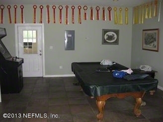 4060 South Francis Road St. Augustine, FL 32092 - Photo 17 of 25 a dining room with furniture and wooden floor