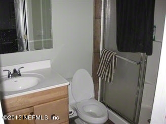 4060 South Francis Road St. Augustine, FL 32092 - Photo 19 of 25 a bathroom with a toilet and a sink
