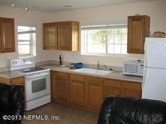 4060 South Francis Road St. Augustine, FL 32092 - Photo 25 of 25 a kitchen with a sink cabinets and window