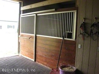 4060 South Francis Road St. Augustine, FL 32092 - Photo 5 of 25 a view of a wooden door