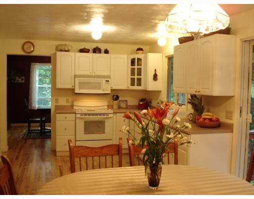 2 Ridgewood Trail Coventry, RI 02827 - Photo 9 of 12 Kitchen. Very large eat-in-kitchen, with built-in desk, hardwood floors and room to add a center island.