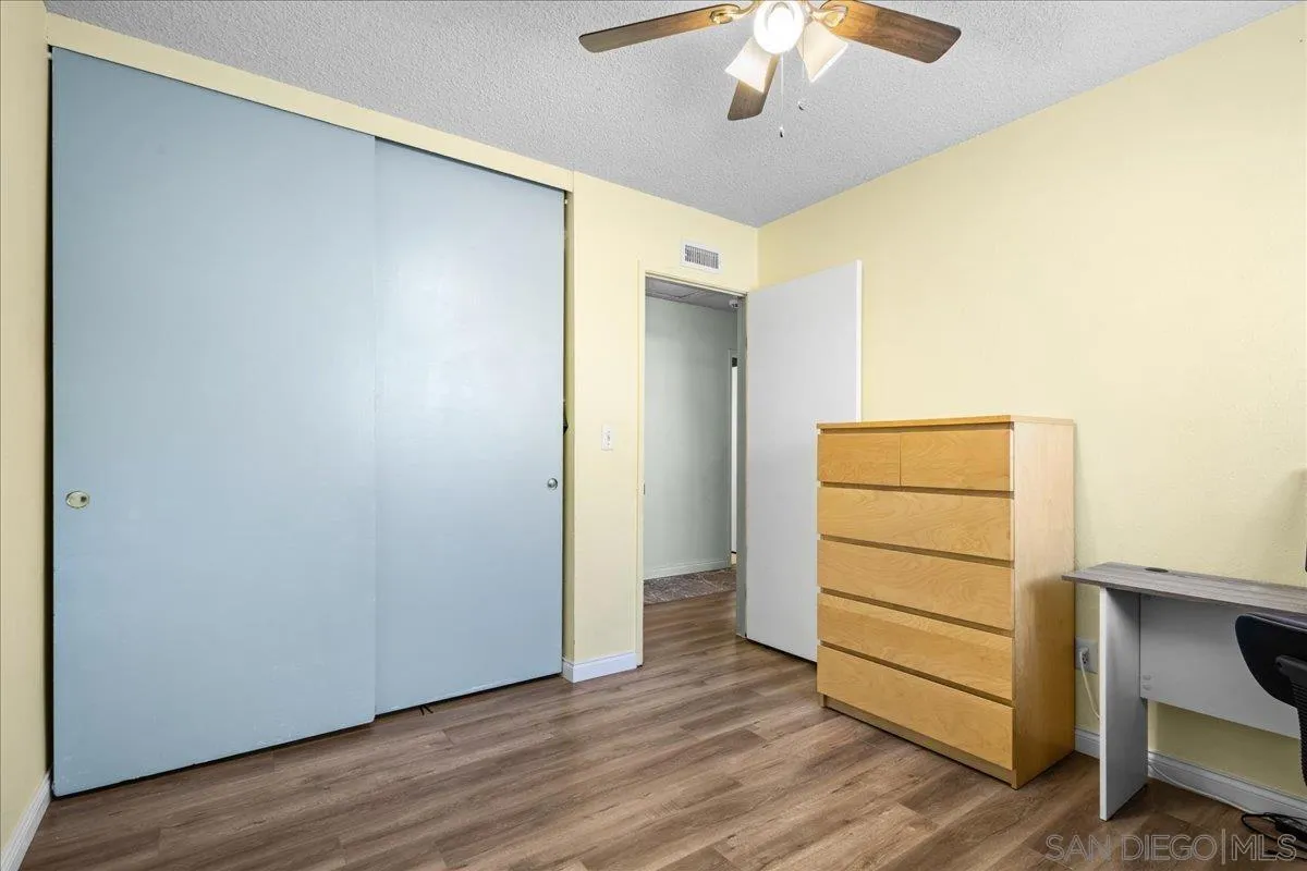 10738 2nd Street Santee, CA 92071 - Photo 17 of 52 a view of walk in closet with empty racks