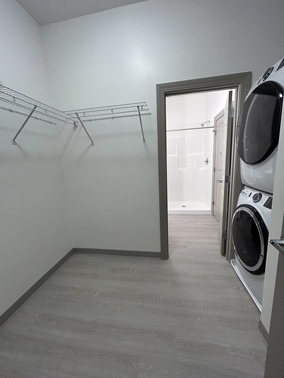 626 Main Street, Unit 209 Dennis, MA 02639 - Photo 9 of 18 a view of a storage & utility room with washer and dryer