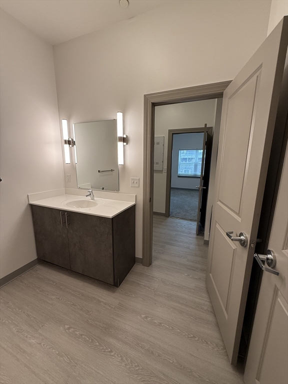 626 Main Street, Unit 209 Dennis, MA 02639 - Photo 10 of 18 a room with a cabinets and a sink