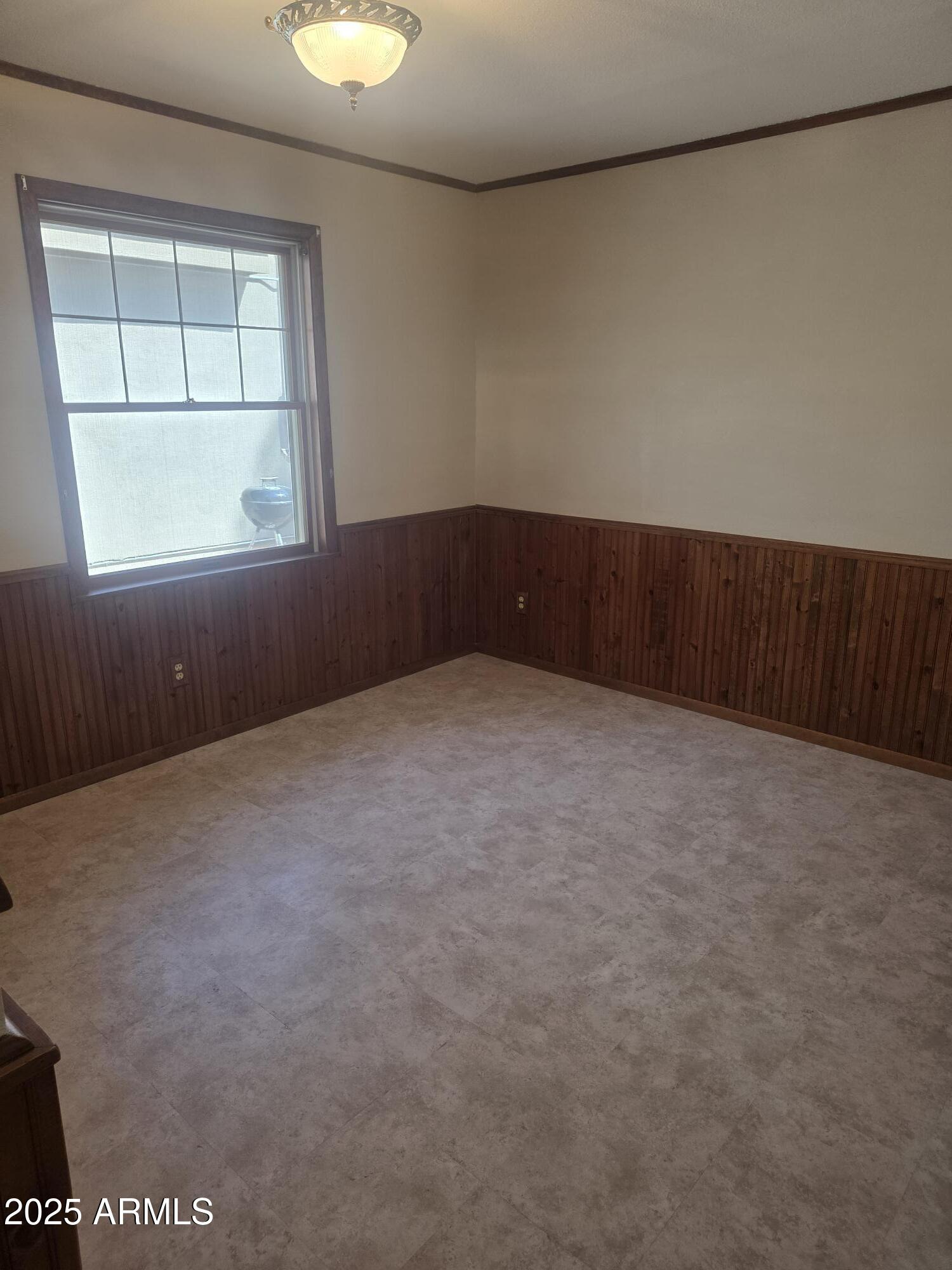 10242 East Spring Creek Road Sun Lakes, AZ 85248 - Photo 15 of 30 an empty room with a window