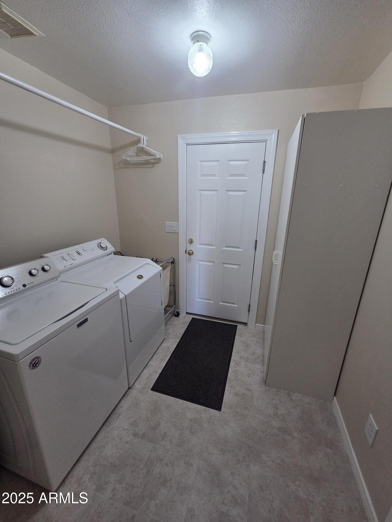 10242 East Spring Creek Road Sun Lakes, AZ 85248 - Photo 26 of 30 a utility room with dryer and washer