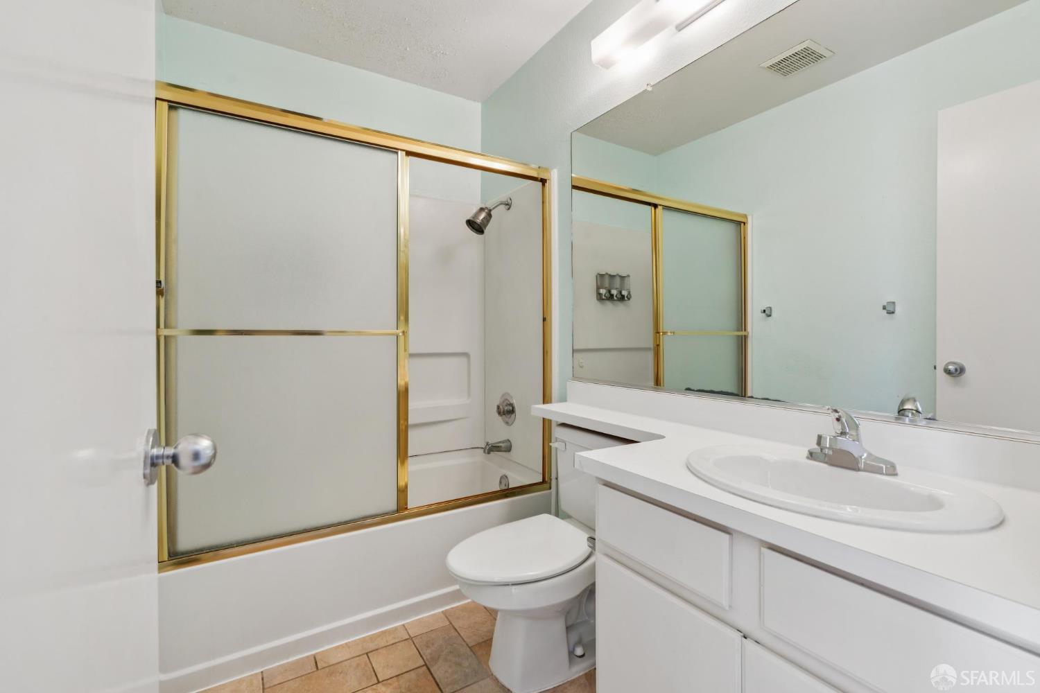 4628 Melody Drive, Unit D Concord, CA 94521 - Photo 18 of 30 a bathroom with a sink toilet and shower