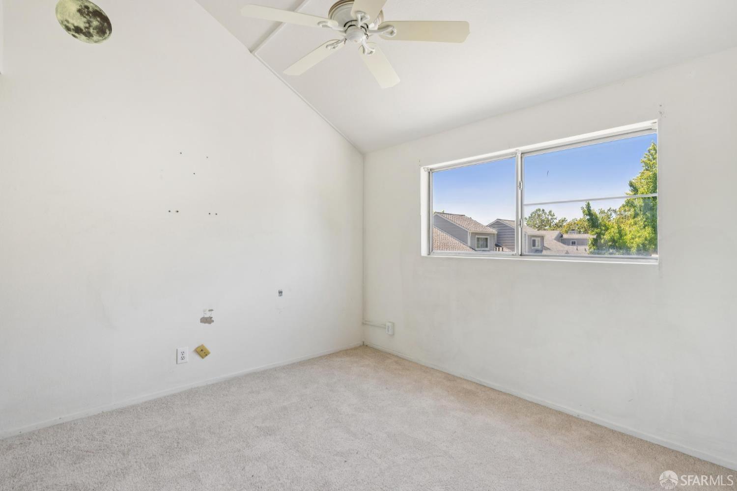 4628 Melody Drive, Unit D Concord, CA 94521 - Photo 23 of 30 a view of an empty room with a window