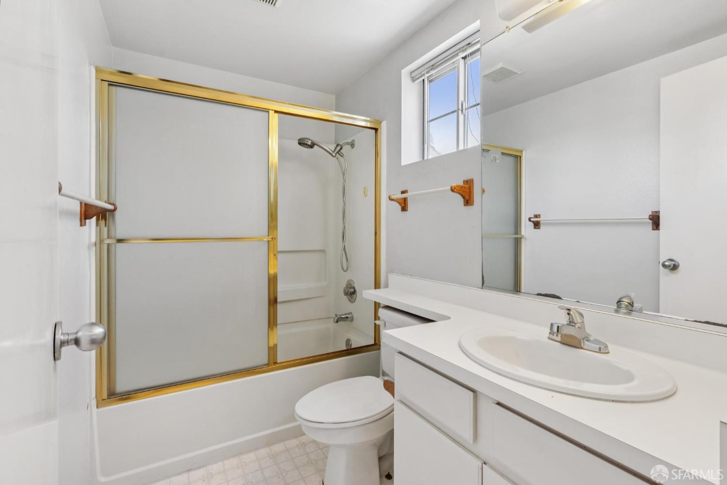 4628 Melody Drive, Unit D Concord, CA 94521 - Photo 24 of 30 a bathroom with a sink toilet and shower