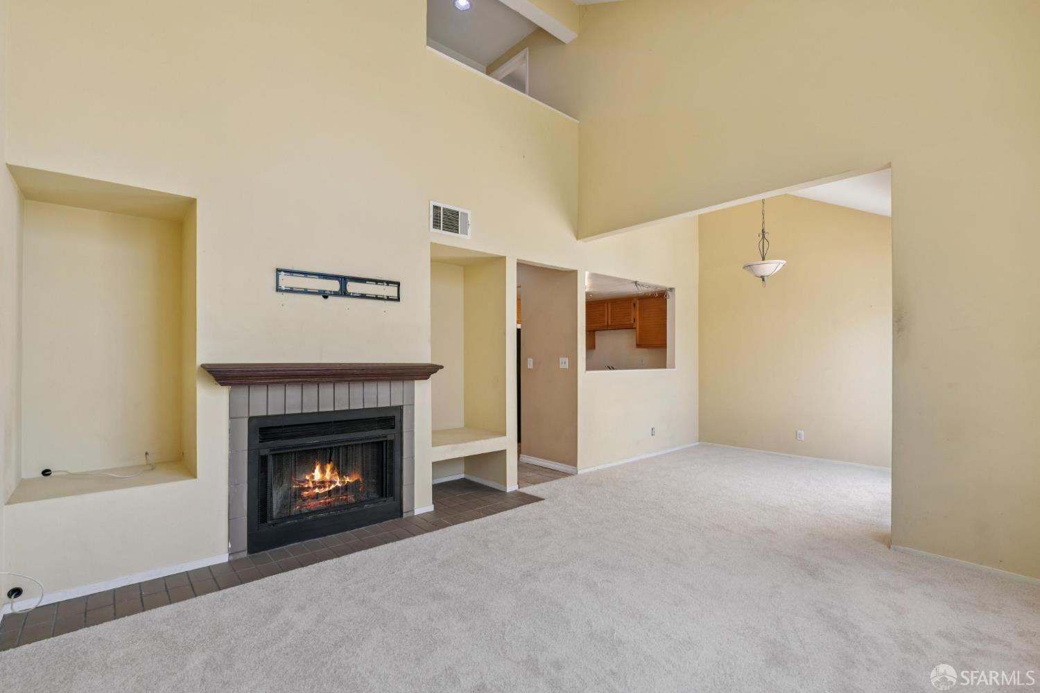 4628 Melody Drive, Unit D Concord, CA 94521 - Photo 4 of 30 a view of an empty room with a fireplace