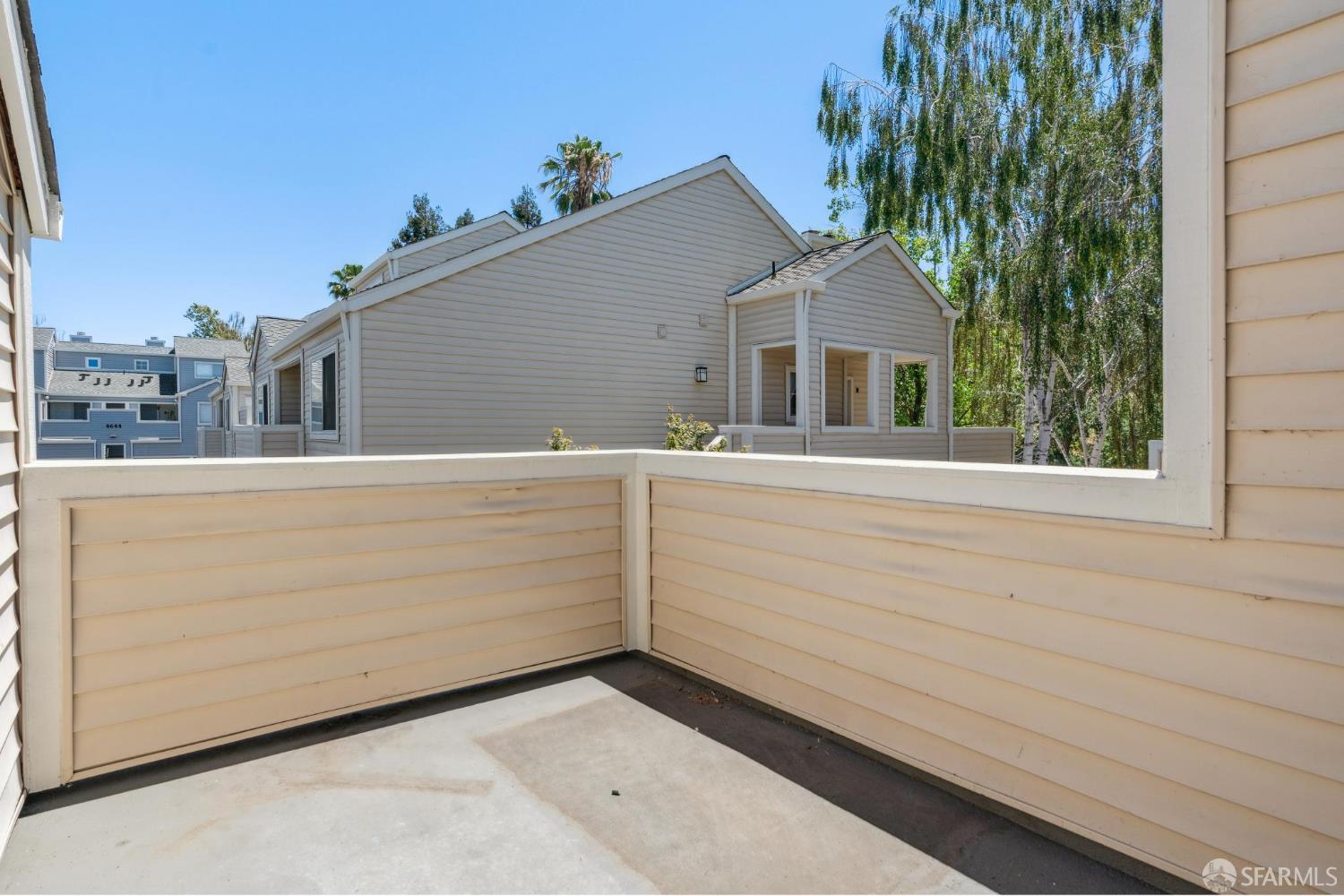 4628 Melody Drive, Unit D Concord, CA 94521 - Photo 9 of 30 a view of a house with a backyard