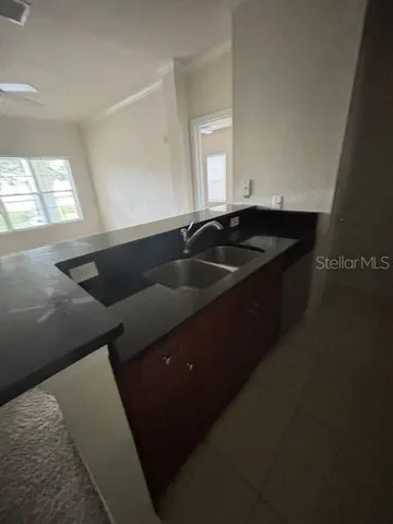 a view of a hallway view with wooden floor