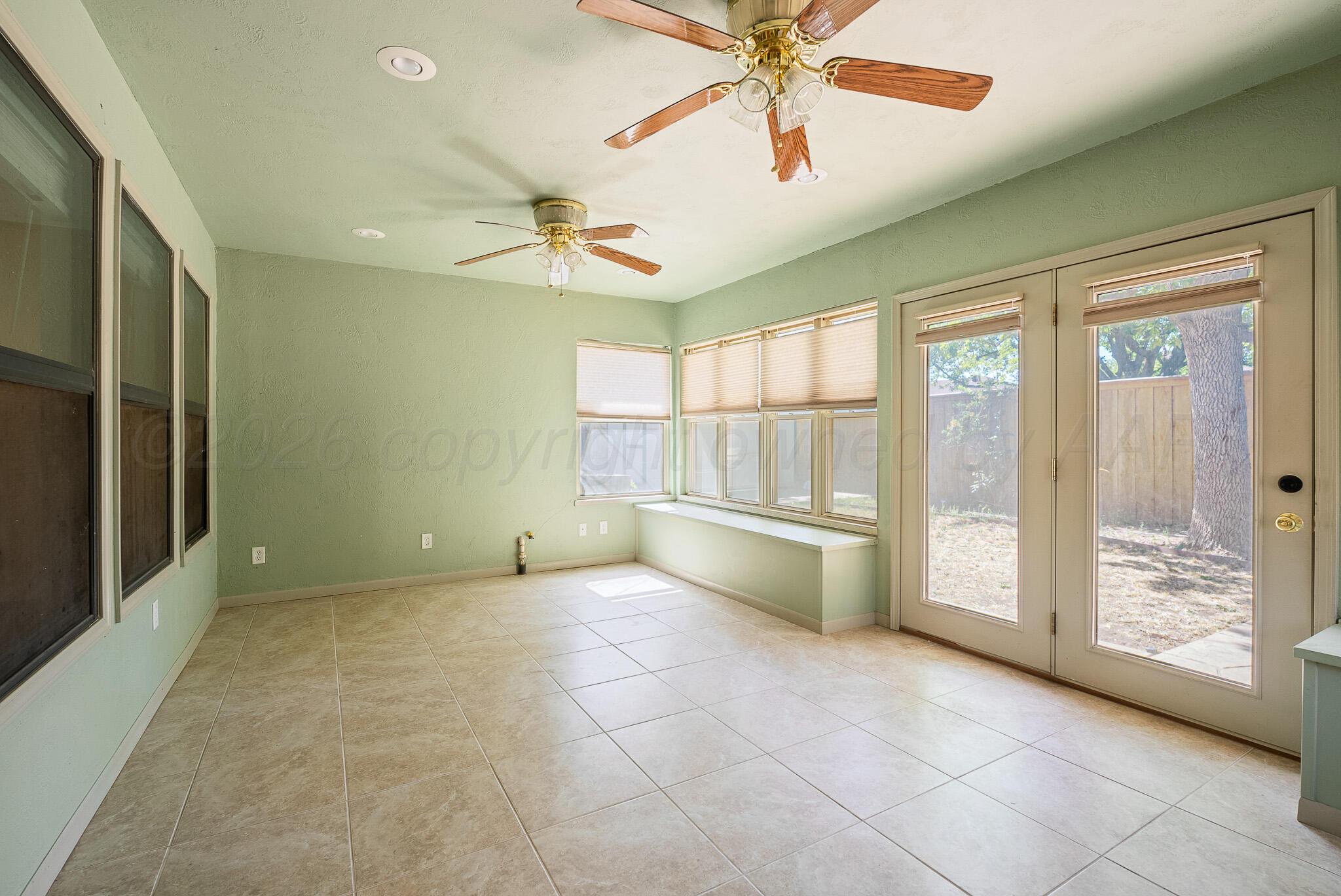 6005 Calumet Road Amarillo, TX 79106 - Photo 15 of 20 Sunroom view 2