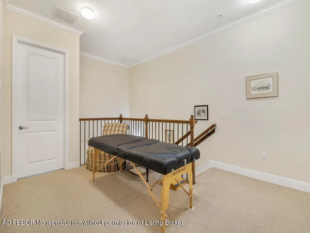 a view of walk in closet with clothes