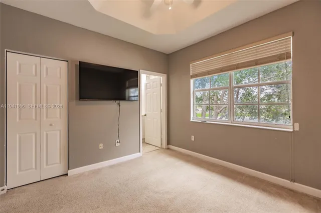 a view of a livingroom with a flat screen tv