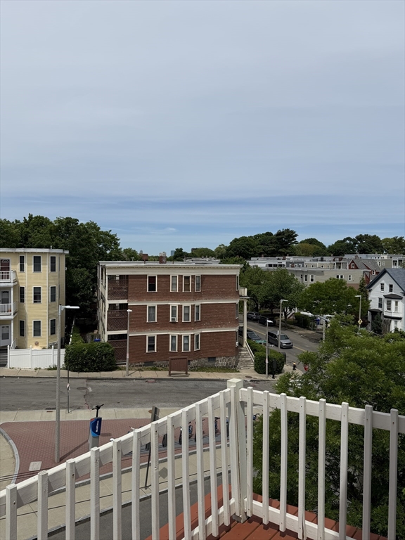 8 Ogden Street Boston, MA 02124 - Photo 19 of 20 a view of a city with tall buildings