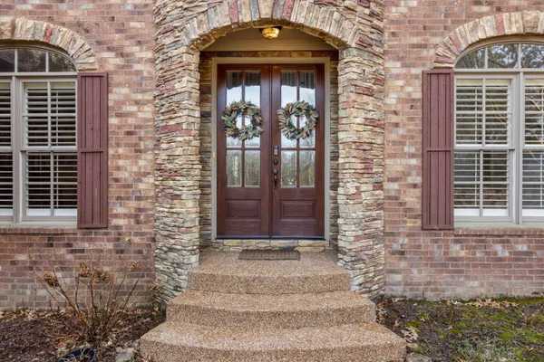 a view of a livingroom with furniture and window
