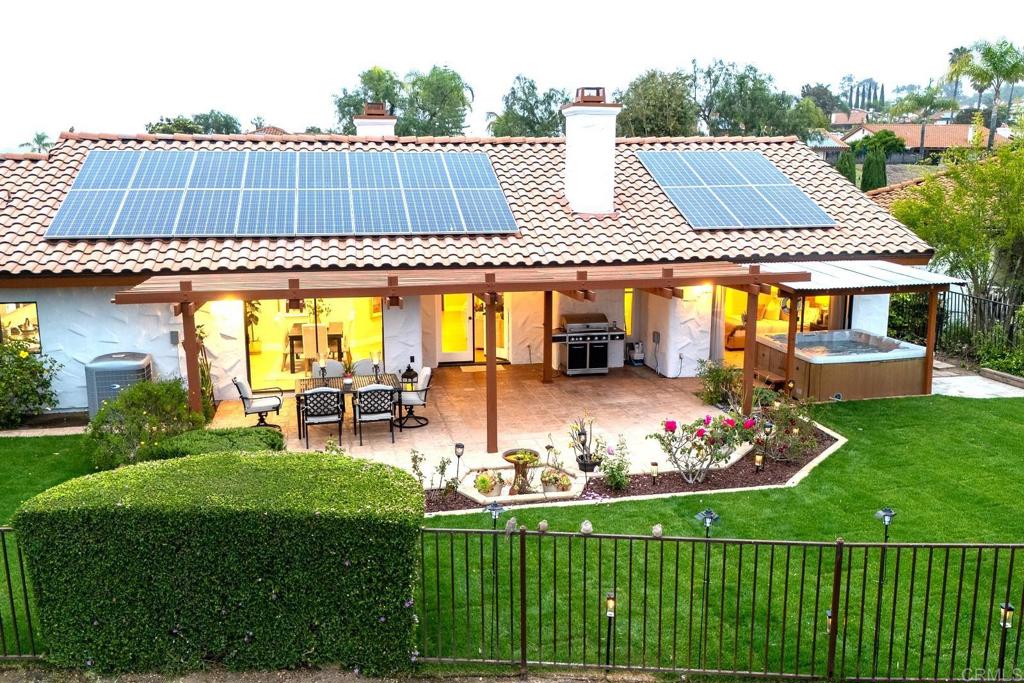 a view of swimming pool with outdoor seating and city view