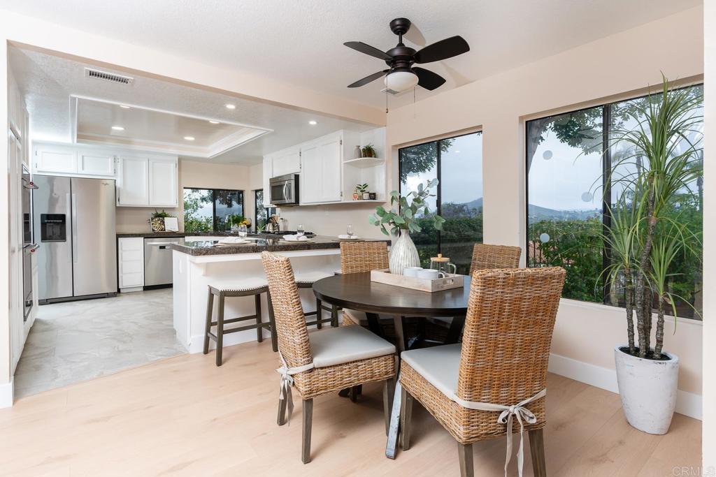 3913 Summer Way Escondido, CA 92025 - Photo 11 of 40 a dining room with furniture window and wooden floor