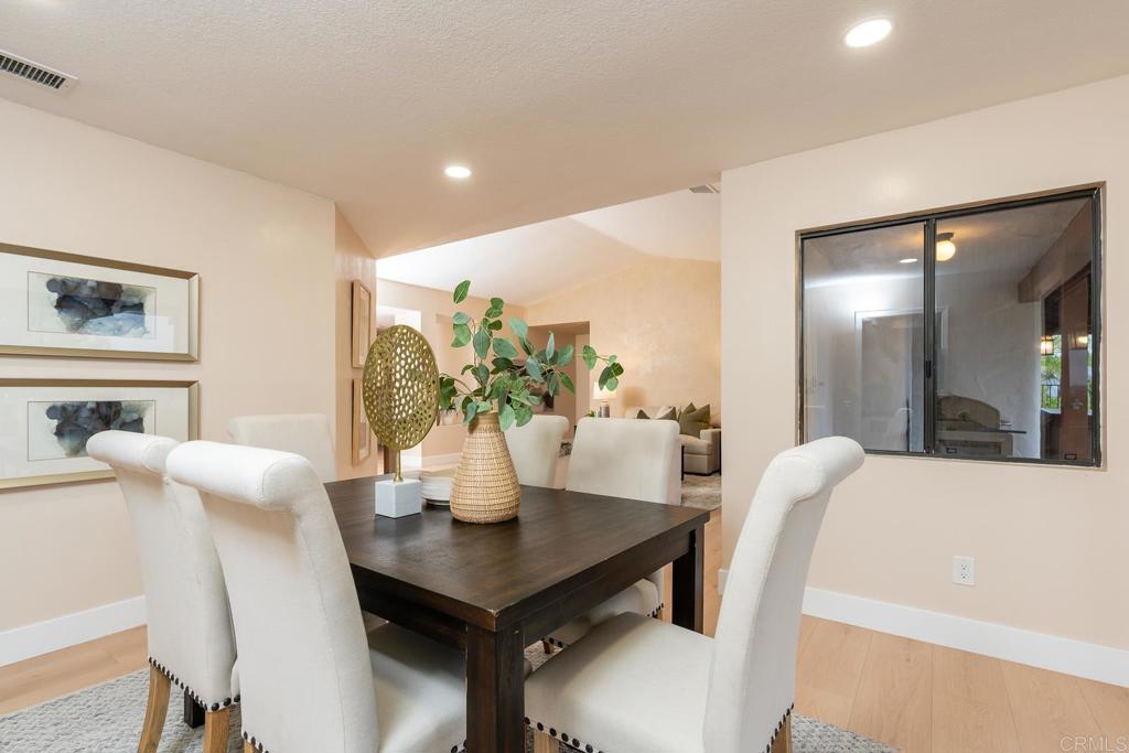 3913 Summer Way Escondido, CA 92025 - Photo 13 of 40 a view of a dining room with furniture and window