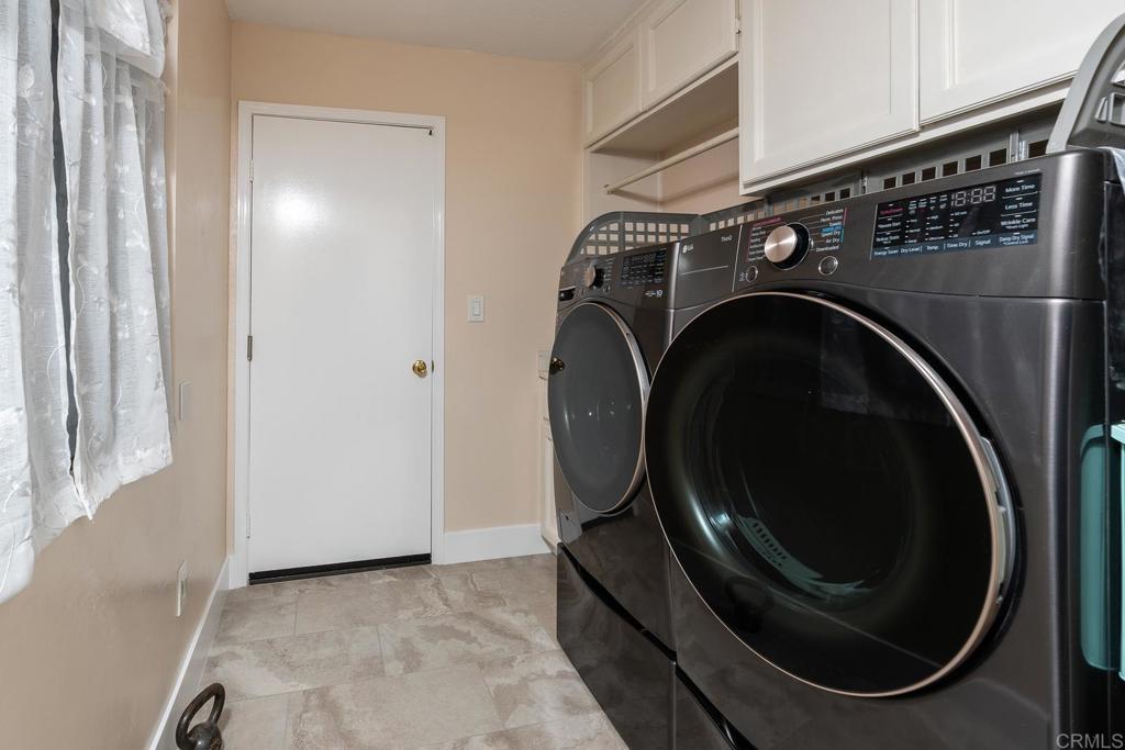 3913 Summer Way Escondido, CA 92025 - Photo 19 of 40 a close view of utility and utility room with washer and dryer