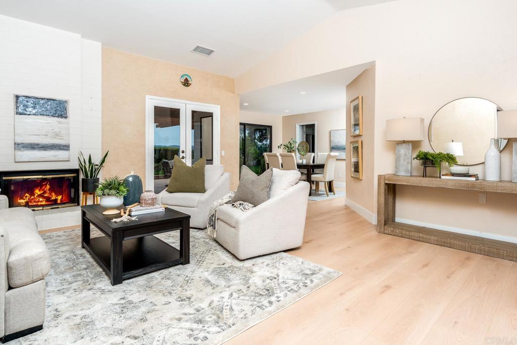 3913 Summer Way Escondido, CA 92025 - Photo 2 of 40 a living room with furniture and a fireplace