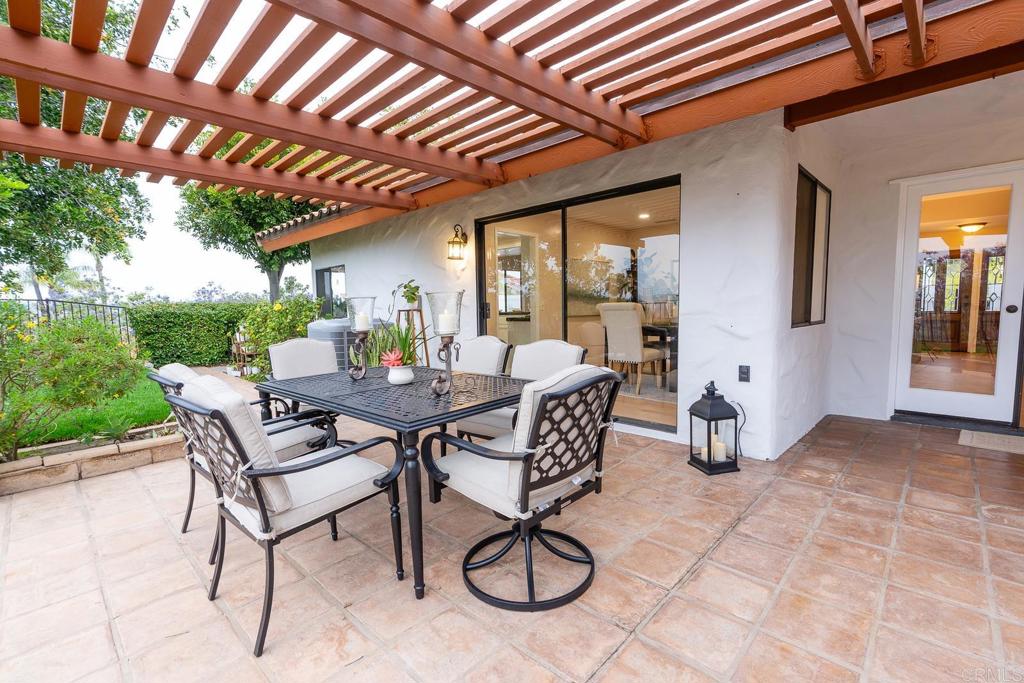 3913 Summer Way Escondido, CA 92025 - Photo 26 of 40 a view of a patio with table and chairs