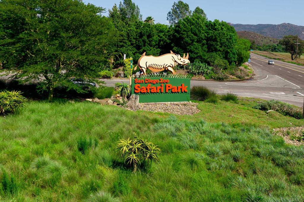 3913 Summer Way Escondido, CA 92025 - Photo 39 of 40 a sign that is sitting in the grass next to a road